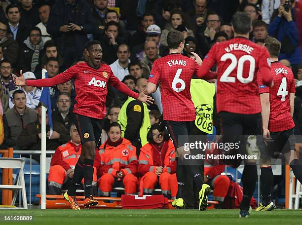 Danny Welbeck of Manchester United celebrates scoring their first goal during the UEFA Champions League Round of 16 first leg match between Real...