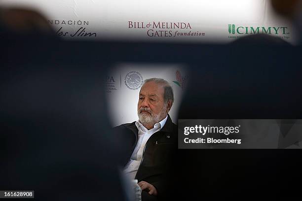 Billionaire Carlos Slim listens during a news conference with Bill Gates, unseen, to announce donations to Mexico's International Maize and Wheat...
