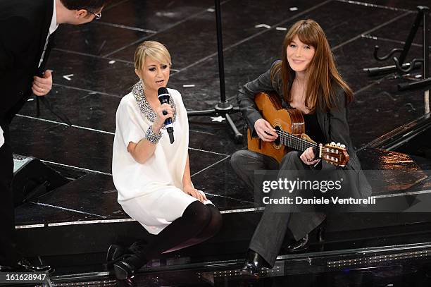 Luciana Littizzetto and Carla Bruni attend the second night of the 63rd Sanremo Song Festival at the Ariston Theatre on February 13, 2013 in Sanremo,...