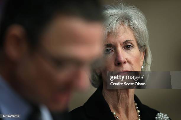 Health and Human Services Secretary Kathleen Sebelius waits to be introduced during a press conference at the Erie Family Health Center on February...