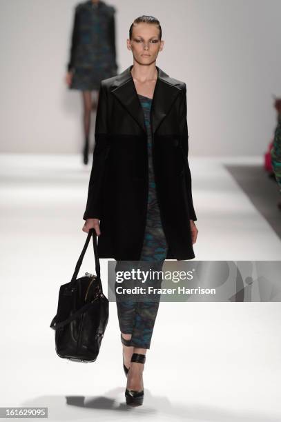 Model walks the runway at the Nanette Lepore Fall 2013 fashion show during Mercedes-Benz Fashion Week at Lincoln Center on February 13, 2013 in New...