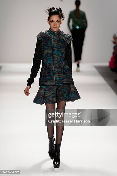 Model walks the runway at the Nanette Lepore Fall 2013 fashion show during Mercedes-Benz Fashion Week at Lincoln Center on February 13, 2013 in New...