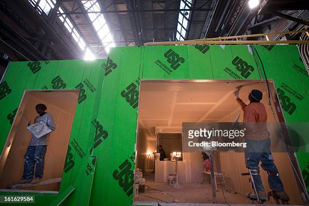 Capsys Corp. Employees work on the drywall of a modular housing unit at the Brooklyn Navy Yard in the Brooklyn borough of New York, U.S., on...
