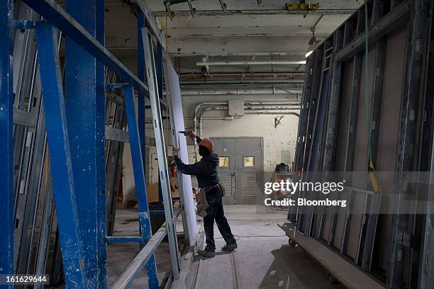 Capsys Corp. Employee works on the steel frame of a modular housing unit at the Brooklyn Navy Yard in the Brooklyn borough of New York, U.S., on...