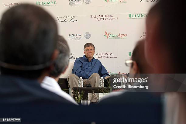 Billionaire Bill Gates listens during a news conference with Carlos Slim, unseen, to announce donations to Mexico's International Maize and Wheat...