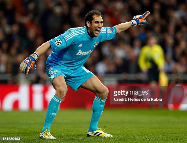 Real Madrid goalkeeper Diego Lopez gestures during the UEFA Champions League Round of 16 first leg match between Real Madrid and Manchester United at...