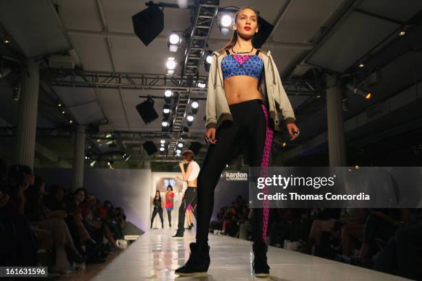 Model walks the runway during Boy Meets Girl by Stacy Igel the "Invasion Collections" Fashion Show at STYLE360 presented by Conair Fashion Pavilion...