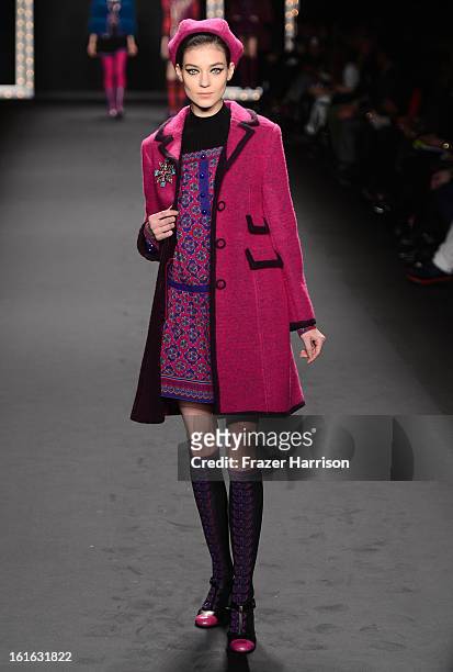 Model walks the runway at the Anna Sui Fall 2013 fashion show during Mercedes-Benz Fashion Week at The Theatre at Lincoln Center on February 13, 2013...