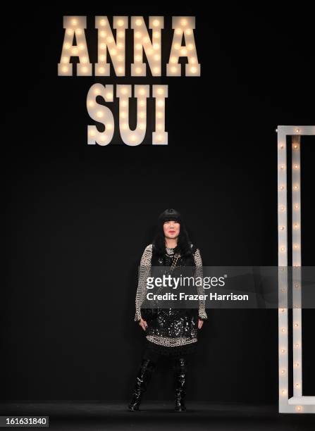 Designer Anna Sui walks the runway at the Anna Sui Fall 2013 fashion show during Mercedes-Benz Fashion Week at The Theatre at Lincoln Center on...