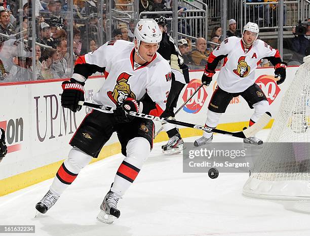 Marc Methot of the Ottawa Senators watches the loose puck during the first period against the Pittsburgh Penguins on February 13, 2013 at Consol...