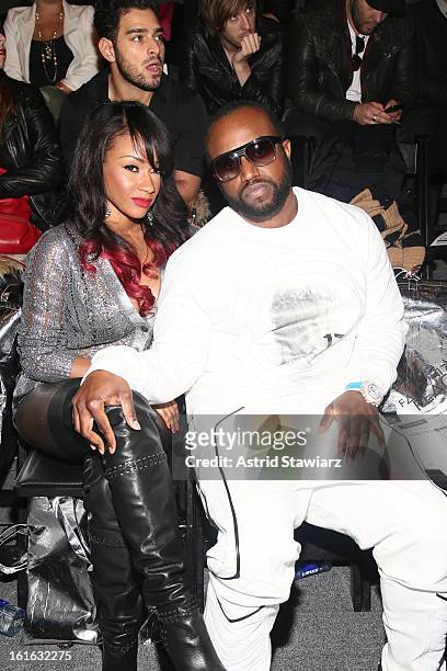 Robin V and Rico Love attend the Falguni & Shane Peacock Fall 2013 fashion show during Mercedes-Benz Fashion Week at The Studio at Lincoln Center on...