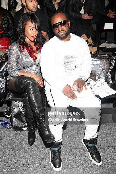 Robin V and Rico Love attend the Falguni & Shane Peacock Fall 2013 fashion show during Mercedes-Benz Fashion Week at The Studio at Lincoln Center on...