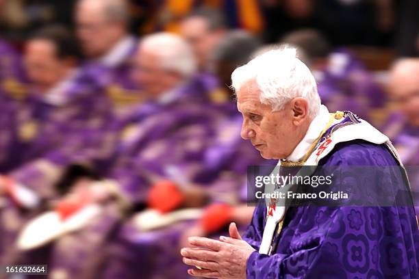 Pope Benedict XVI leads the Ash Wednesday service at the St. Peter's Basilica on February 13, 2013 in Vatican City, Vatican. Ash Wednesday opens the...