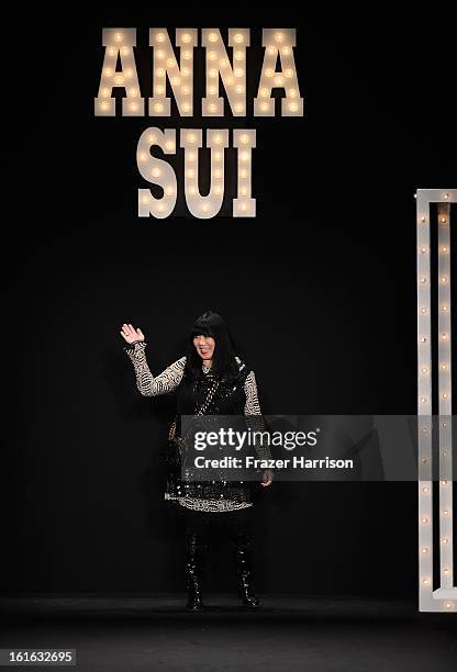 Designer Anna Sui walks the runway at the Anna Sui Fall 2013 fashion show during Mercedes-Benz Fashion Week at The Theatre at Lincoln Center on...