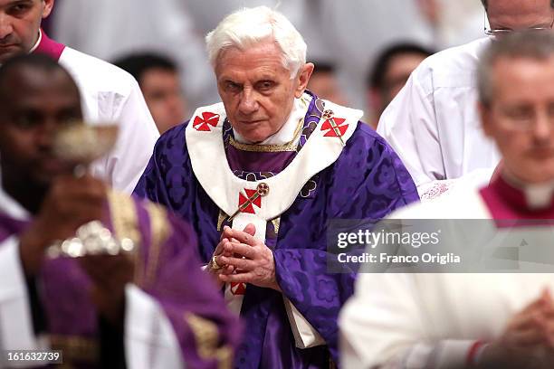 Pope Benedict XVI leads the Ash Wednesday service at the St. Peter's Basilica on February 13, 2013 in Vatican City, Vatican. Ash Wednesday opens the...