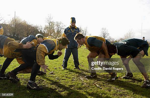 Eddie Jones, the Wallaby coach watches the forward scrumaging during Australian rugby union training at St Paul's School, Hammersmith, London,...