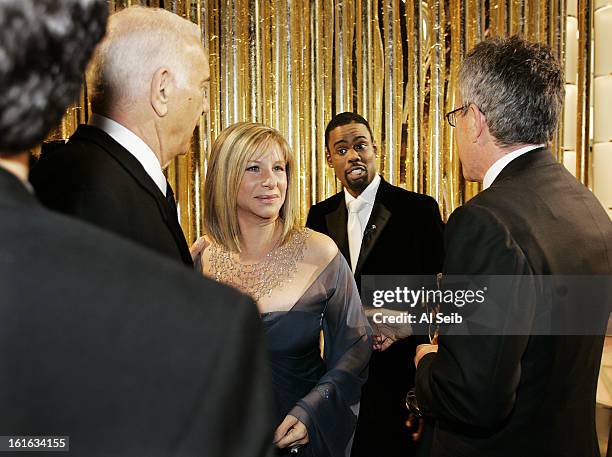Singer Barbara Streisand and actor Chris Rock are photographed backstage with co-producers Albert Ruddy and Tom Rosenberg at the 77th Annual Academy...