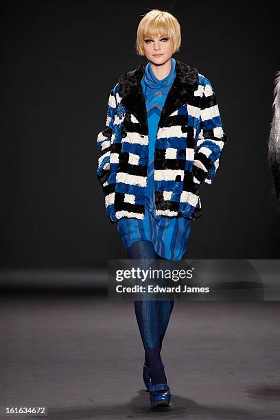 Model Jessica Stam walks the runway at Anna Sui during Fall 2013 Mercedes-Benz Fashion Week at The Theatre at Lincoln Center on February 13, 2013 in...