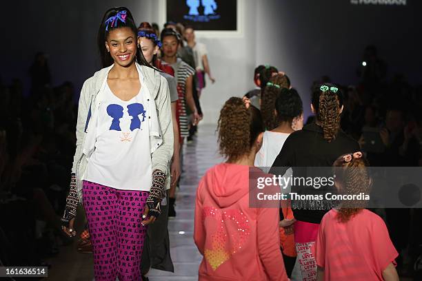 Models walk the runway during the Boy Meets Girl by Stacy Igel the "Invasion Collections" Fashion Show at STYLE360 presented by Conair Fashion...
