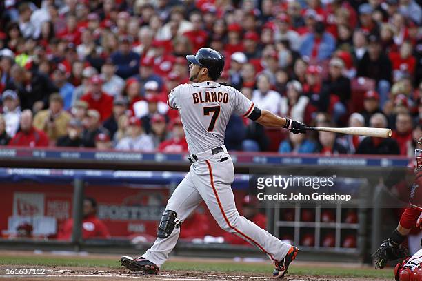 Gregor Blanco of the San Francisco Giants hits a two run home run in the top of the second inning during Game 4 of the National League Division...