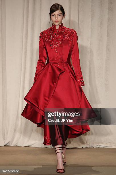 Model walks the runway at the Marchesa Fall 2013 fashion show during Mercedes-Benz Fashion Week at New York Public Library - Celeste Bartos on...