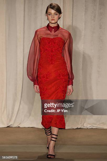 Model walks the runway at the Marchesa Fall 2013 fashion show during Mercedes-Benz Fashion Week at New York Public Library - Celeste Bartos on...