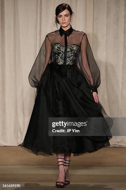 Model walks the runway at the Marchesa Fall 2013 fashion show during Mercedes-Benz Fashion Week at New York Public Library - Celeste Bartos on...