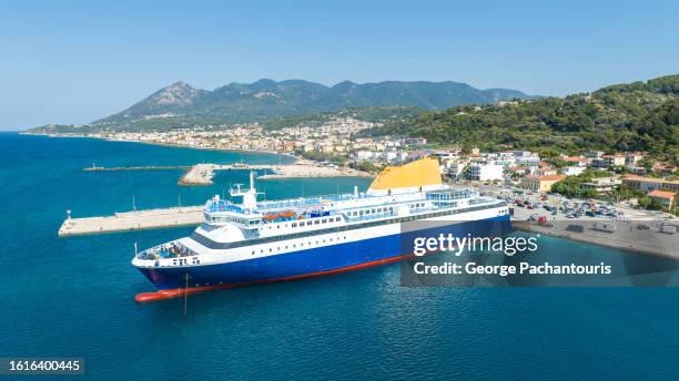 aerial photo of a passenger ship at the harbor - kreuzfahrtschiff stock-fotos und bilder