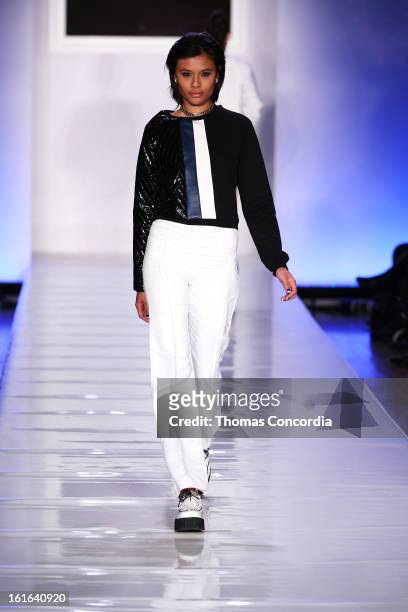 Model walks the runway at Junk Food Art House and Sony Pictures presents "Le Look Smurfette" at STYLE360 presented by Conair Fashion Pavilion on...
