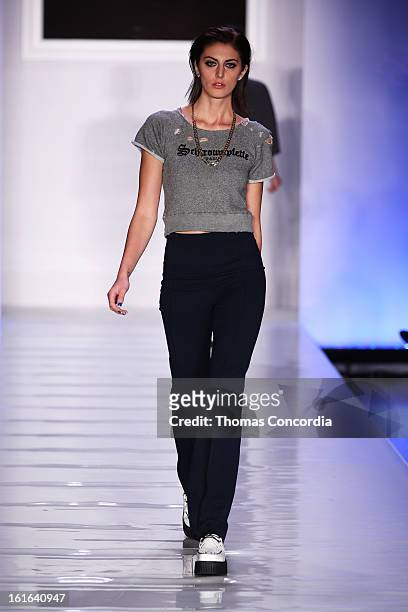 Model walks the runway at Junk Food Art House and Sony Pictures presents "Le Look Smurfette" at STYLE360 presented by Conair Fashion Pavilion on...