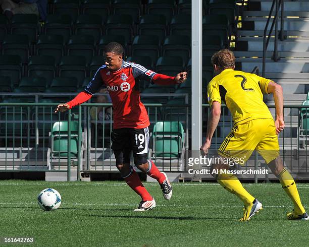 Midfielder Reggie Lambe of Toronto FC tsets to pass against the Columbus Crew February 9, 2013 in the first round of the Disney Pro Soccer Classic in...