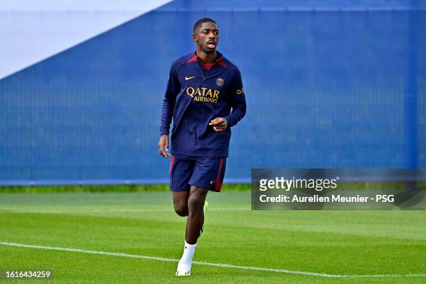 Ousmane Dembeme warms up during a Paris Saint-Germain training session at Campus PSG on August 15, 2023 in Paris, France.