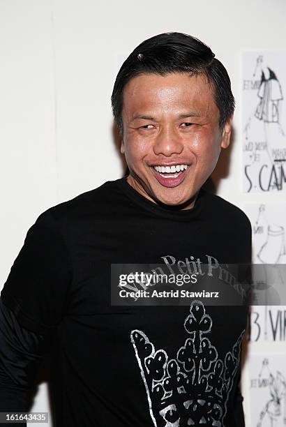 Designer Zang Toi backstage at the Zang Toi Fall 2013 fashion show during Mercedes-Benz Fashion Week at The Stage at Lincoln Center on February 13,...