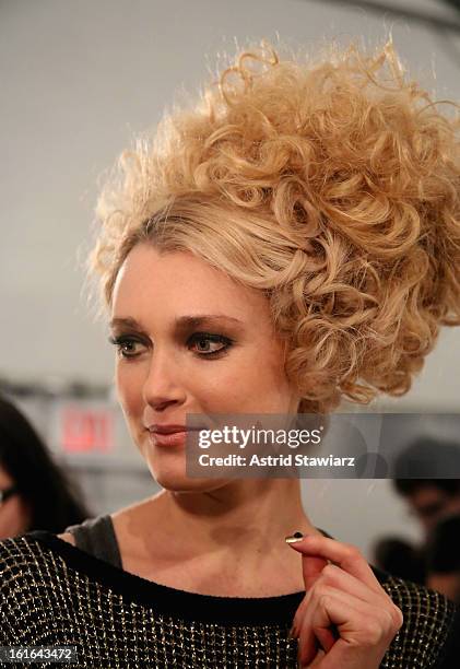 Model prepares backstage at the Zang Toi Fall 2013 fashion show during Mercedes-Benz Fashion Week at The Stage at Lincoln Center on February 13, 2013...