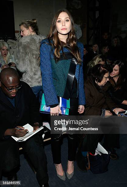 Actress Elizabeth Olson attends the Proenza Schouler fall 2013 fashion show during Mercedes-Benz Fashion Week on February 13, 2013 in New York City.