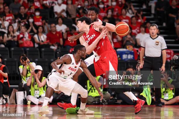 Yuta Watanabe of Japan injures his ankle after drives to the basket during the international basketball game between Japan and Angola at Ariake Arena...