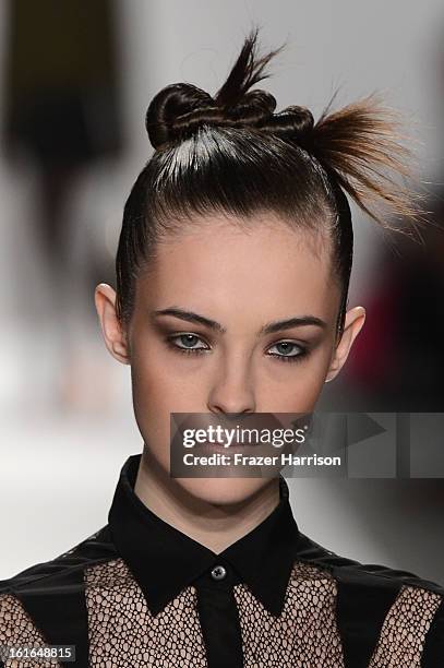 Model walks the runway at the Nanette Lepore Fall 2013 fashion show during Mercedes-Benz Fashion Week at The Stage at Lincoln Center on February 13,...