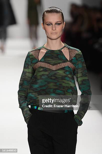 Model walks the runway at the Nanette Lepore Fall 2013 fashion show during Mercedes-Benz Fashion Week at The Stage at Lincoln Center on February 13,...
