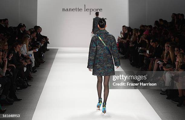 Model walks the runway at the Nanette Lepore Fall 2013 fashion show during Mercedes-Benz Fashion Week at The Stage at Lincoln Center on February 13,...