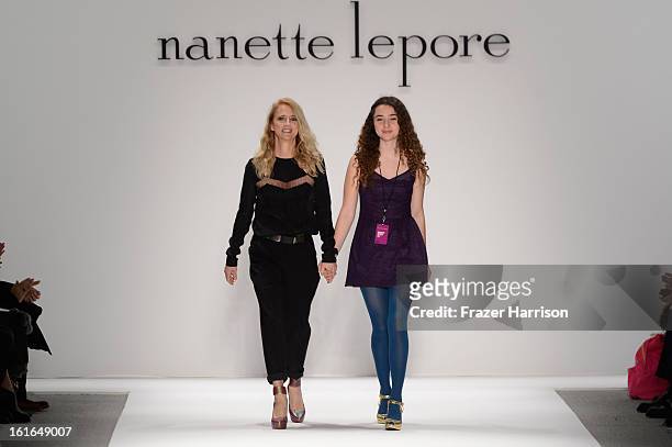 Designer Nanette Lepore and daughter Violet Lepore walk the runway at the Nanette Lepore Fall 2013 fashion show during Mercedes-Benz Fashion Week at...