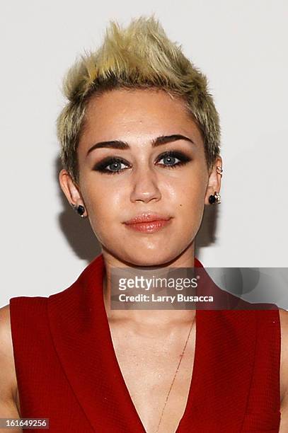 Miley Cyrus attends the Rachel Zoe Fall 2013 fashion show during Mercedes-Benz Fashion Week at The Studio at Lincoln Center on February 13, 2013 in...