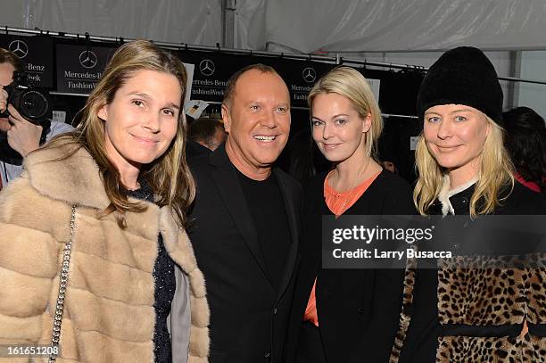 Aerin Lauder , designer Michael Kors and Renee Rockefeller backstage at the Michael Kors Fall 2013 fashion show during Mercedes-Benz Fashion Week at...