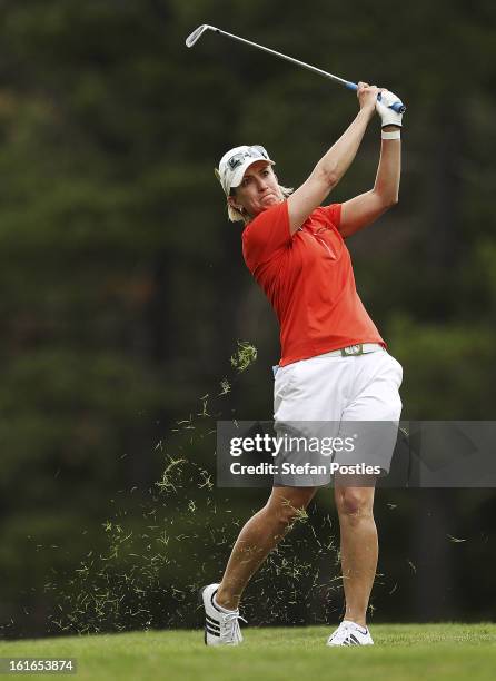 Karrie Webb of Australia hits off the fairway during day one of the ISPS Handa Australian Open at Royal Canberra Golf Club on February 14, 2013 in...