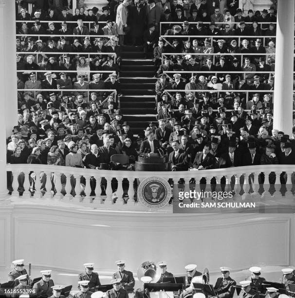 President John Fitzgerald Kennedy delivers his inaugural address, on January 20, 1961 at United States Capitol Building, Washington DC, during...