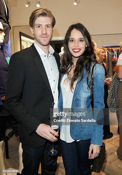 Chelsea Tyler and actor Jon Foster attends Tommy Hilfiger New West Coast Flagship Opening on Robertson Boulevard on February 13, 2013 in West...
