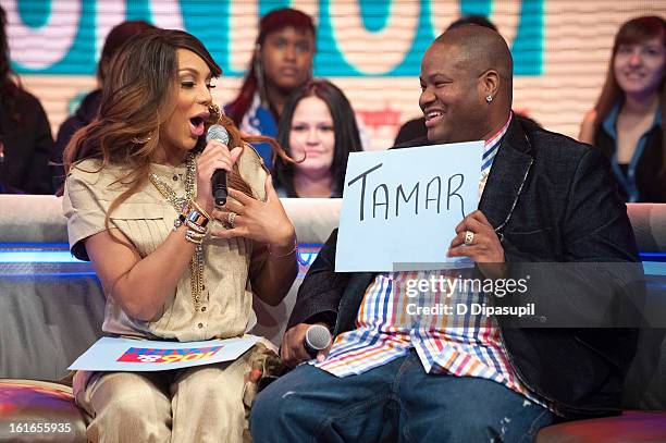 Tamar Braxton and husband Vincent Herbert visit BET's '106 & Park' at BET Studios on February 13, 2013 in New York City.