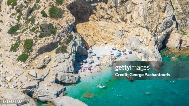 seychelles beach on ikaria island, greece - insel ikaria stock-fotos und bilder