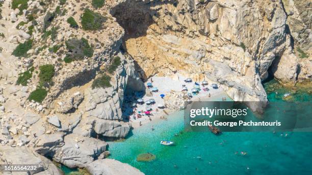 seychelles beach on ikaria island, greece - ikaria island stock pictures, royalty-free photos & images