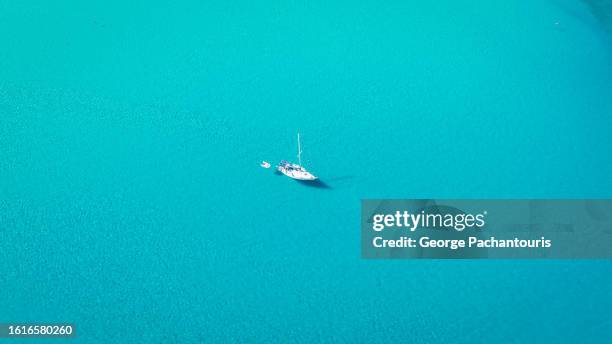 aerial view of sailboat at sea - mar egeo fotografías e imágenes de stock