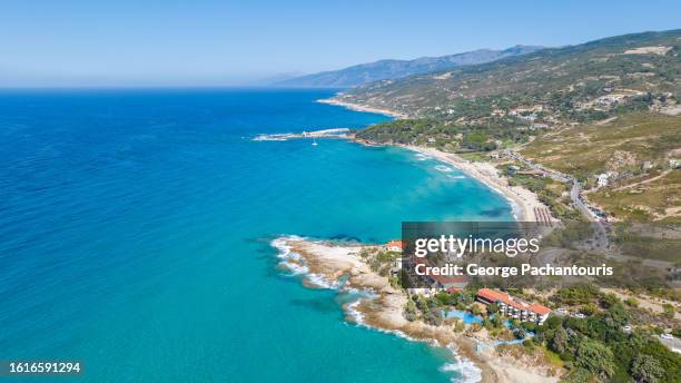 aerial view of the popular mesakti beach on ikaria, greece - ikaria island stock pictures, royalty-free photos & images